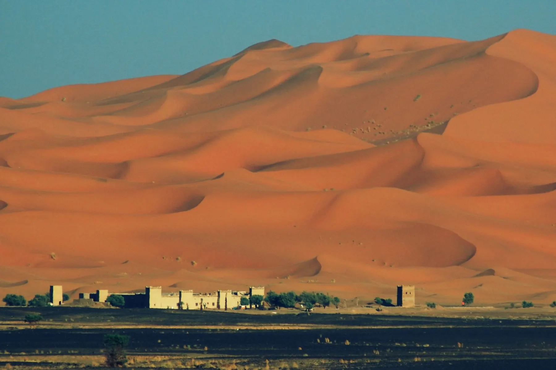 Kasbah-style lodges at the foot of the Erg Chebbi dunes in Merzouga